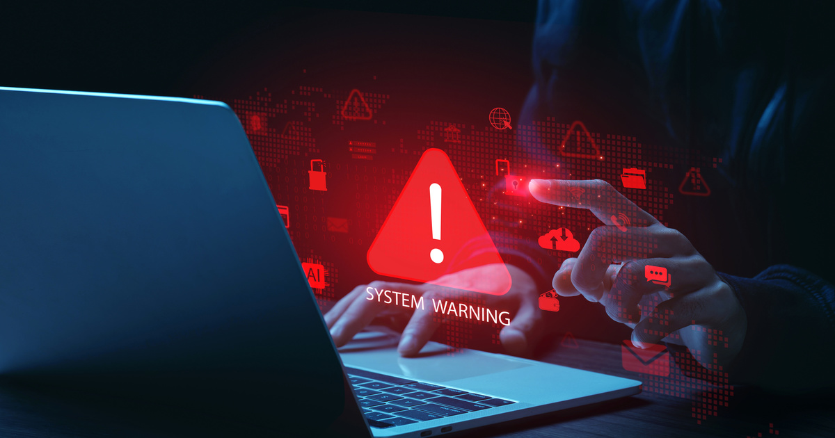 Concepto de fuga de datos y alerta de ciberseguridad en un portátil