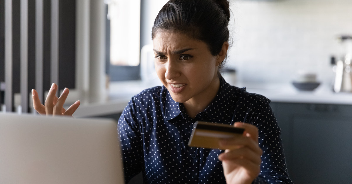 Person struggling to complete a card payment on an online store
