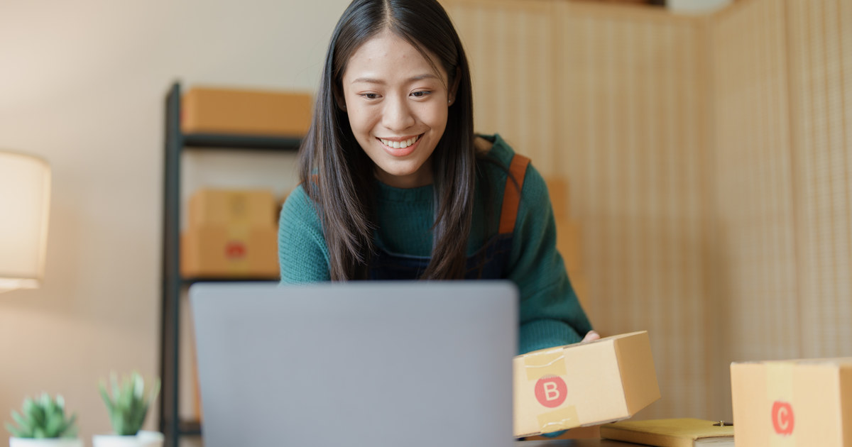 Online store owner preparing orders